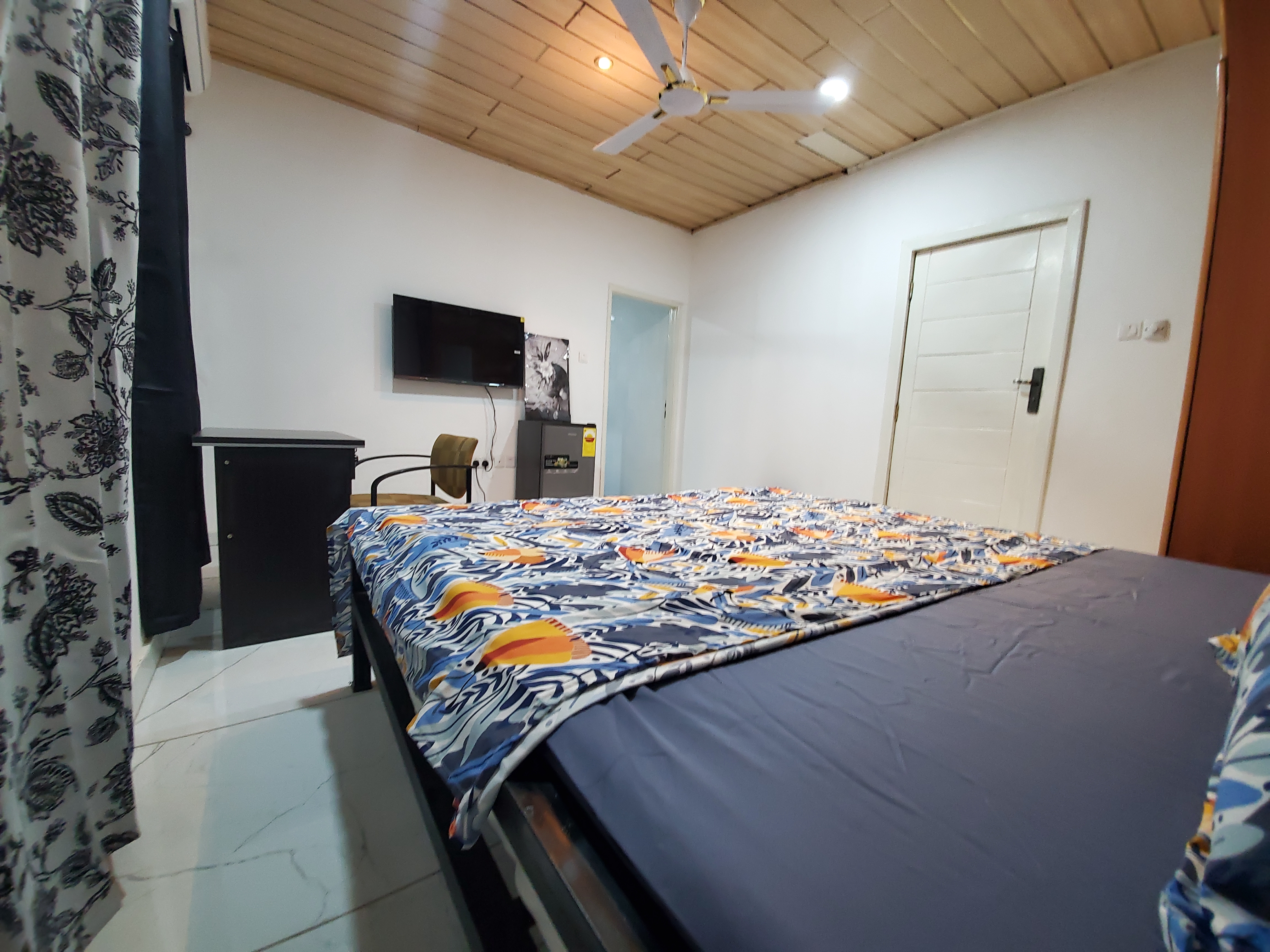 Modern hostel interior with comfortable beds and social spaces